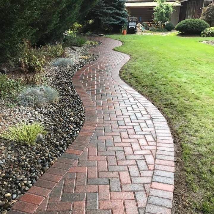 picture of a newly installed paver walkway with beige textured pavers