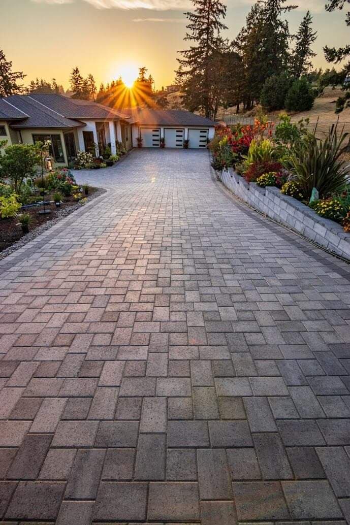 picture of a newly installed long paver driveway